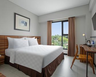 Grand Mozza Hotel - Timika - Habitación