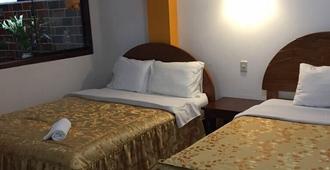 Hostal Bromelias Inn - Machu Picchu - Bedroom