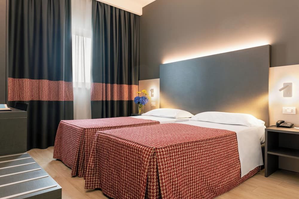 هوتل ميتشيلينو 75 باي ذا سيدني هوتل - بولونيا - غرفة نوم