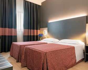 هوتل ميتشيلينو 75 باي ذا سيدني هوتل - بولونيا - غرفة نوم