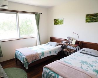 Guest House Diamond - Hostel - Yomitan - Ložnice