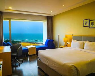 Bay View Hotel Vizag - ויסאקאפאטנם - חדר שינה