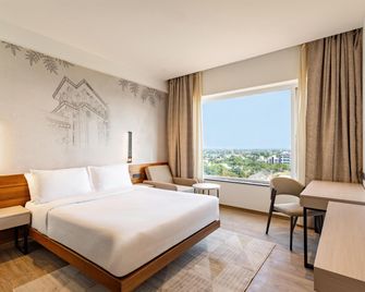 Temple Tree Hotel Shirdi, a member of Radisson Individuals - Shirdi - Schlafzimmer