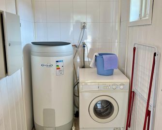 Sanda Camping og Hytteutleie - Bo i Telemark - Wäscheservice