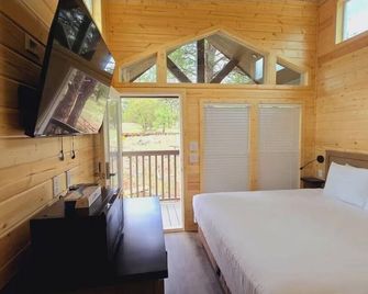 Cozy Tiny Home King Room #24A - Page