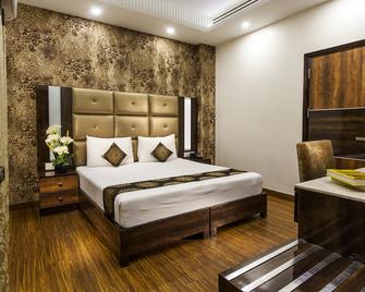 Hotel Sunstar Heritage - New Delhi - Bedroom