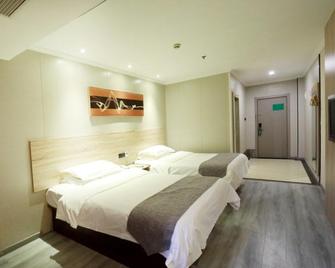Greentree Inn Yancheng Sheyang Xingfuhuacheng Commercial Street Business Hotel - Yancheng - Habitación