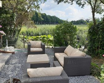 Ruime vrijstaande karakteristieke gezinswoning, direct aan het water - Diepenveen - Patio