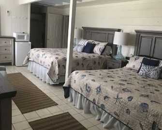 Ginnys Cozy Beach Cottage - Destin - Bedroom