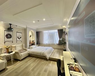 Fujia Boutique Hotel (Bund Branch) - Qujing - Bedroom