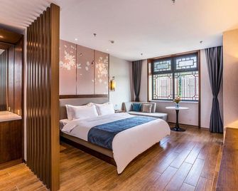 Yingxiang Business Hotel - Chengde - Bedroom