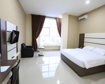 Grand Orion Hotel - Tanjung Pandan - Bedroom