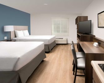 Woodspring Suites Southington - Southington - Bedroom