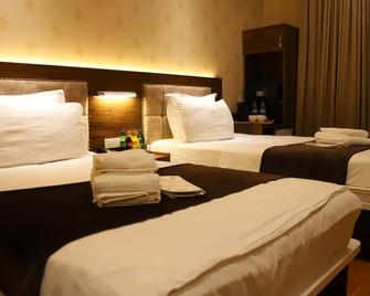 Grand Avenue Hotel - Taškent - Ložnice