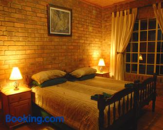 Thaba Tsweni Lodge & Safaris - Graskop - Bedroom