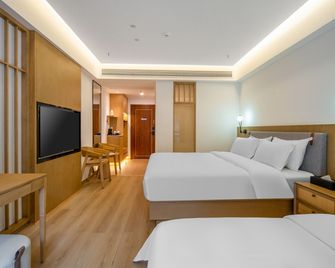 Hunan New Pipaxi Hotel - ג'אנגג'יאיי - חדר שינה