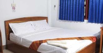 Lankham Hotel - Pakse - Camera da letto