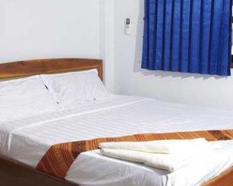 Lankham Hotel - Pakse - Bedroom