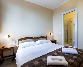 Hotel Properzio - אסיסי - חדר שינה