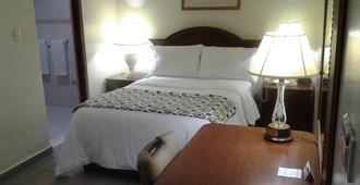 Micro Hotel Condo Suites - Santo Domingo - Bedroom