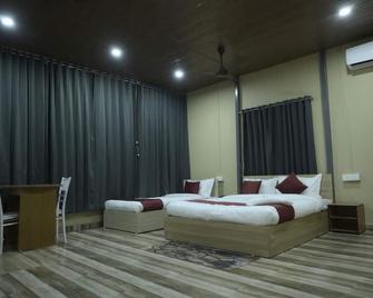 Hotel Pohor Regency - Guwahati - Slaapkamer