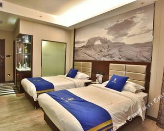 Super 8 by Wyndham Urumqi Airport Ji Chang Bei Qu - Ürümqi - Habitación