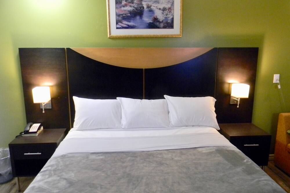 American Plaza Motel - לונדון - חדר שינה