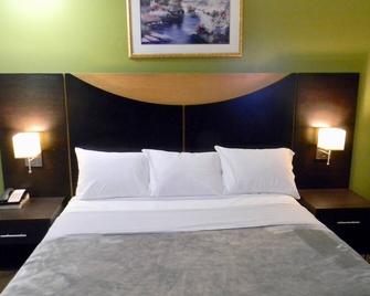 American Plaza Motel - לונדון - חדר שינה