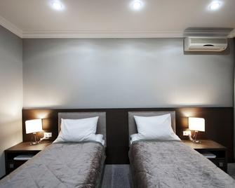Globus Group Fitness Hotel - Lipeck - Camera da letto