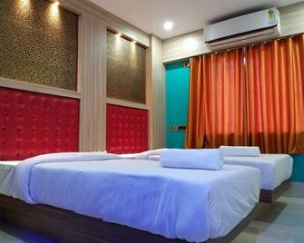 The Bliss Hotel Govinda - Baharampur - Bedroom