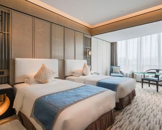 Xiongchu International Hotel - 武漢 - 寝室