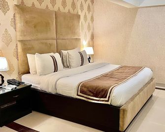 Royal Inn Hotel - Karachi - Bedroom