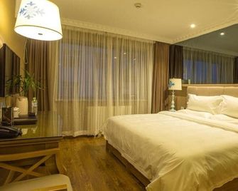 Hohhot Shanghua Boutique Hotel - הוהוט - חדר שינה