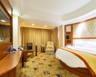 Golden Diamond Hotel - Zhaoqing - Camera da letto