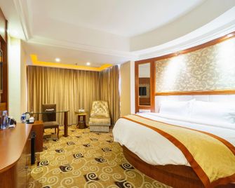 Golden Diamond Hotel - Zhaoqing - Bedroom