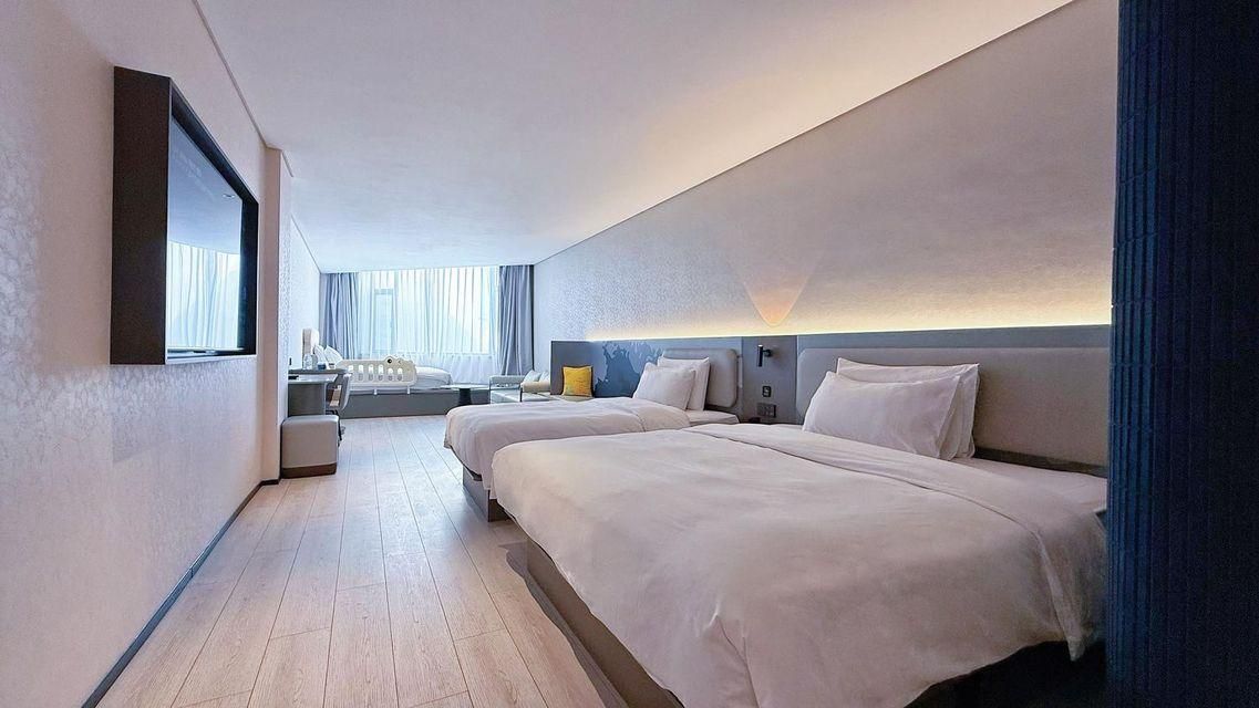 Atour Light Hotel Qingdao North Railway Station Shengping Road - צ'ינגדאו - חדר שינה