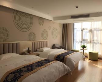 Greentree Inn Suqian Sucheng Area Weishan Lake Road Hotel - Suqian - Bedroom