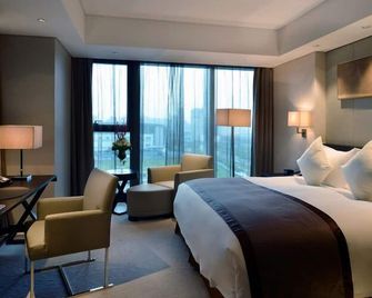 Howard Johnson By Wyndham Ifc Plaza Ningbo - נינגבו - חדר שינה