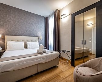 مارتيلي 6 سويتس آند آبارتمنتس - فلورنس - غرفة نوم