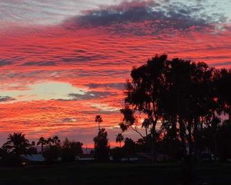 On the golf course-Watch the spectacular sun sets over the lake of the course - Sun Lakes - Outdoors view