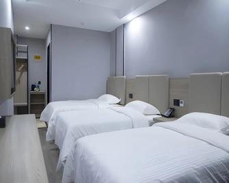 Greentree Inn Anqing Tongcheng South Shengtang Road Shengtang International Business Hotel - Anqing - Bedroom