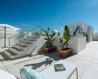 Sercotel Sevilla Guadalquivir Suites - Seville - Balcony