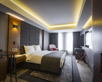 Nova Vista Deluxe & Suites - Doryläum - Schlafzimmer