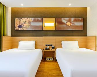 Iu Hotel Xingyi Sports Center - Qianxinan - Bedroom