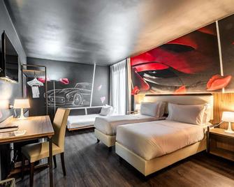 Muraless Art Hotel - Castel d'Azzano - Camera da letto
