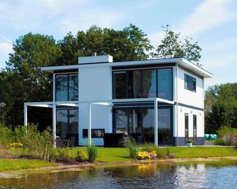 Chalet with 4 bedrooms and a terrace - Nijkerk - Edificio