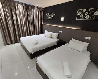 One Point Hotel - Kuching - Bedroom