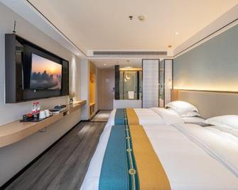 Guilin Jinsangzi International Hotel (Liangjiang Sihu Elephant Trunk Hill) - גילין - חדר שינה