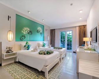 Lantana Boutique Hoi An Hotel - הוי אן - חדר שינה