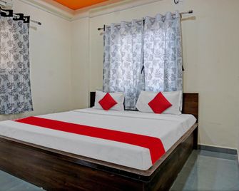 Hotel O Shanaya Lodging - Пуна - Спальня